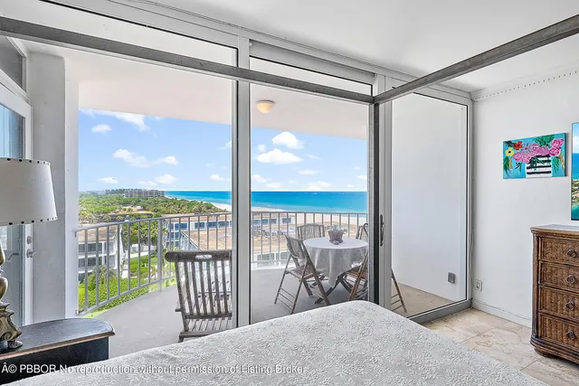 a view of a balcony with chairs
