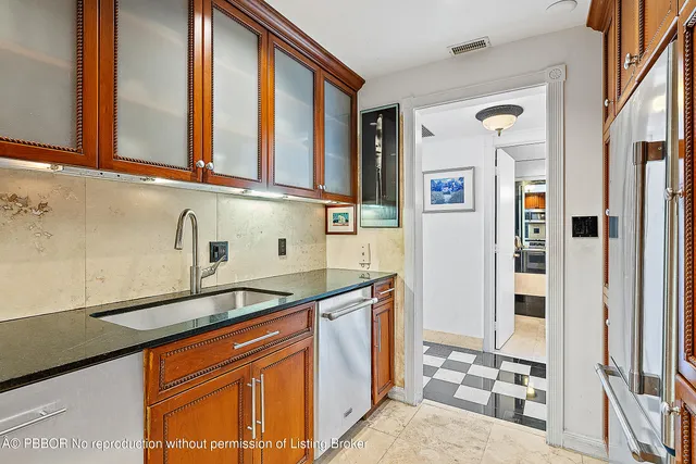 a view of a porch with a floor to ceiling window