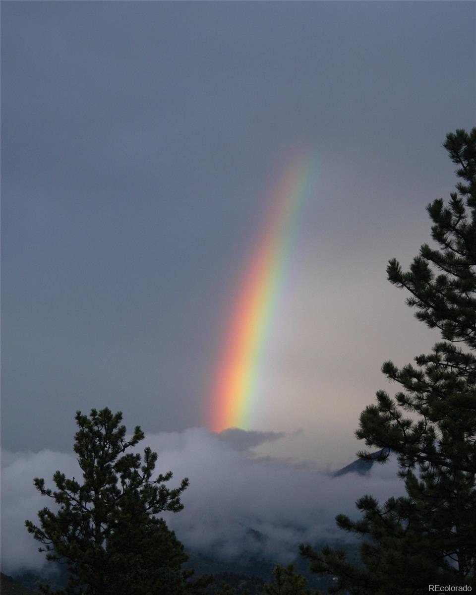 2080 Santa Fe Mountain Road Evergreen, CO 80439 - Photo 47 of 49 a sunset view
