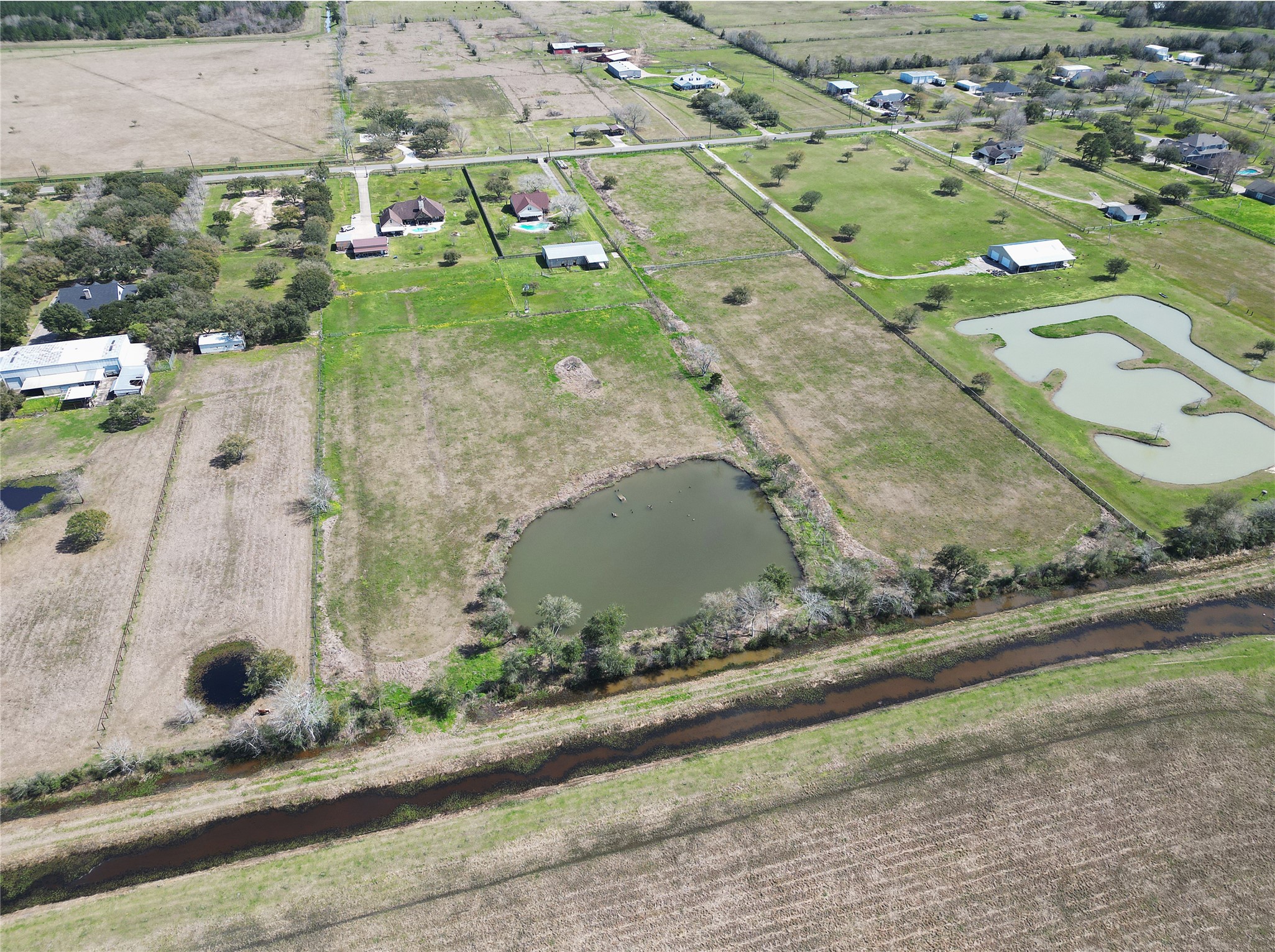3080 South Pine Island Road Beaumont, TX 77713 - Photo 6 of 7 an aerial view of a residential houses