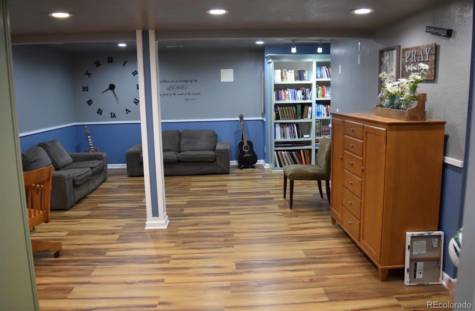 1426 3rd Street Fort Lupton, CO 80621 - Photo 24 of 50 a view of livingroom with furniture and workspace
