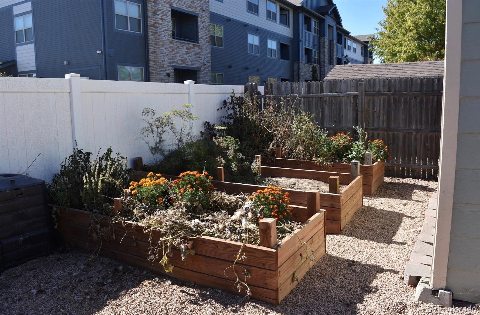 1426 3rd Street Fort Lupton, CO 80621 - Photo 36 of 50 a view of a bench in back yard of a building