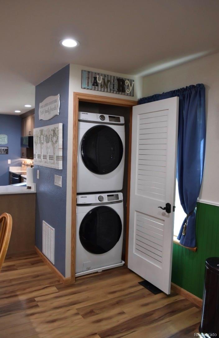 1426 3rd Street Fort Lupton, CO 80621 - Photo 7 of 50 a view of a kitchen with a washer and dryer