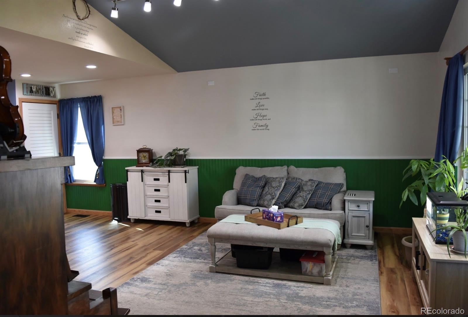 1426 3rd Street Fort Lupton, CO 80621 - Photo 9 of 50 a living room with furniture and view of couch