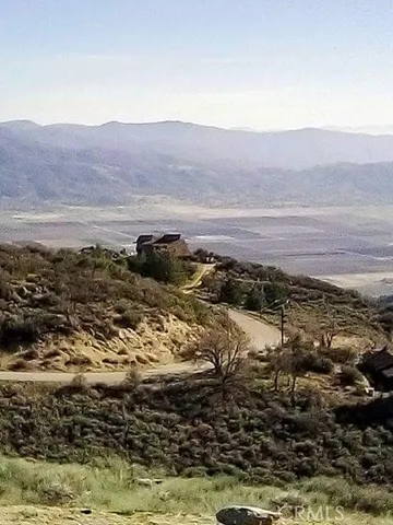 a kitchen with granite countertop a stove and a refrigerator