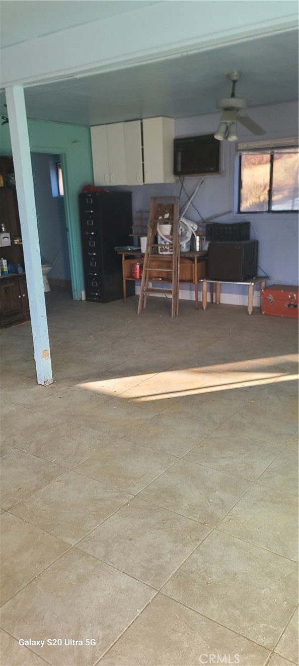 23441 El Rancho Drive Tehachapi, CA 93561 - Photo 24 of 30 a view of a room with gym equipment