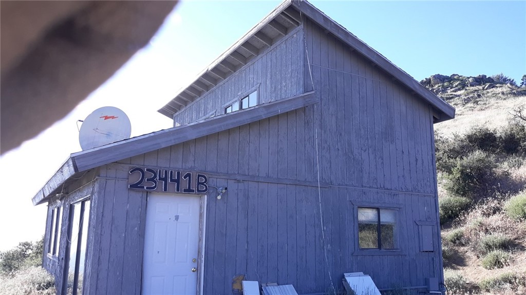 23441 El Rancho Drive Tehachapi, CA 93561 - Photo 7 of 30 a view of a wooden door