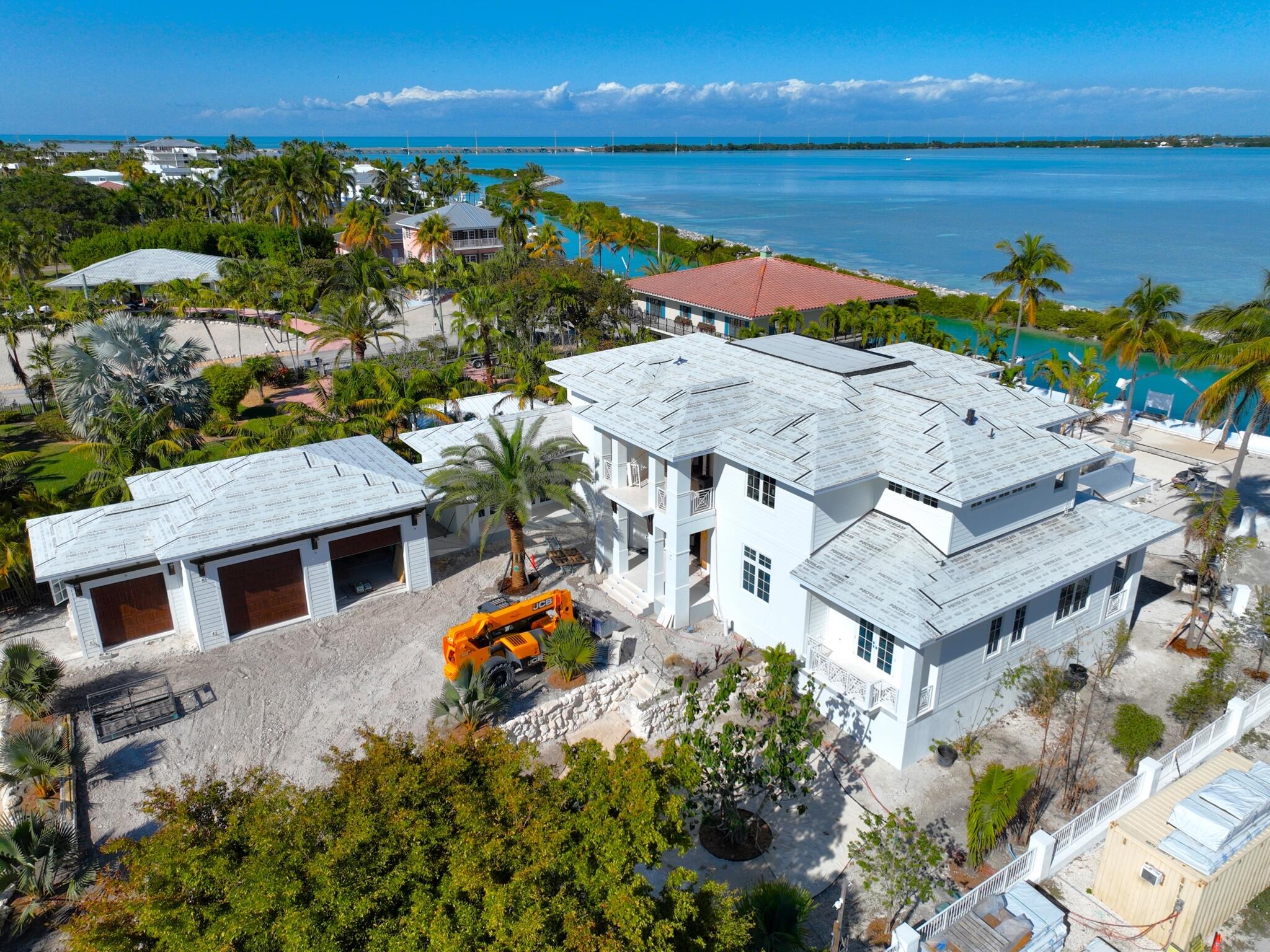 304 Melaleuca Street Marathon, FL 33050 - Photo 5 of 16 a aerial view of a house with a lake view