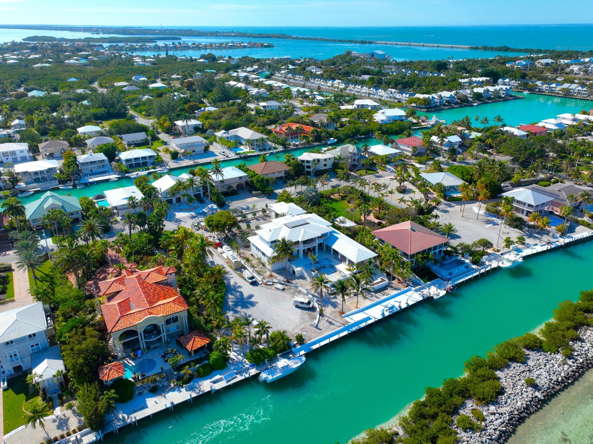 304 Melaleuca Street Marathon, FL 33050 - Photo 8 of 16 an aerial view of residential houses with outdoor space and swimming pool