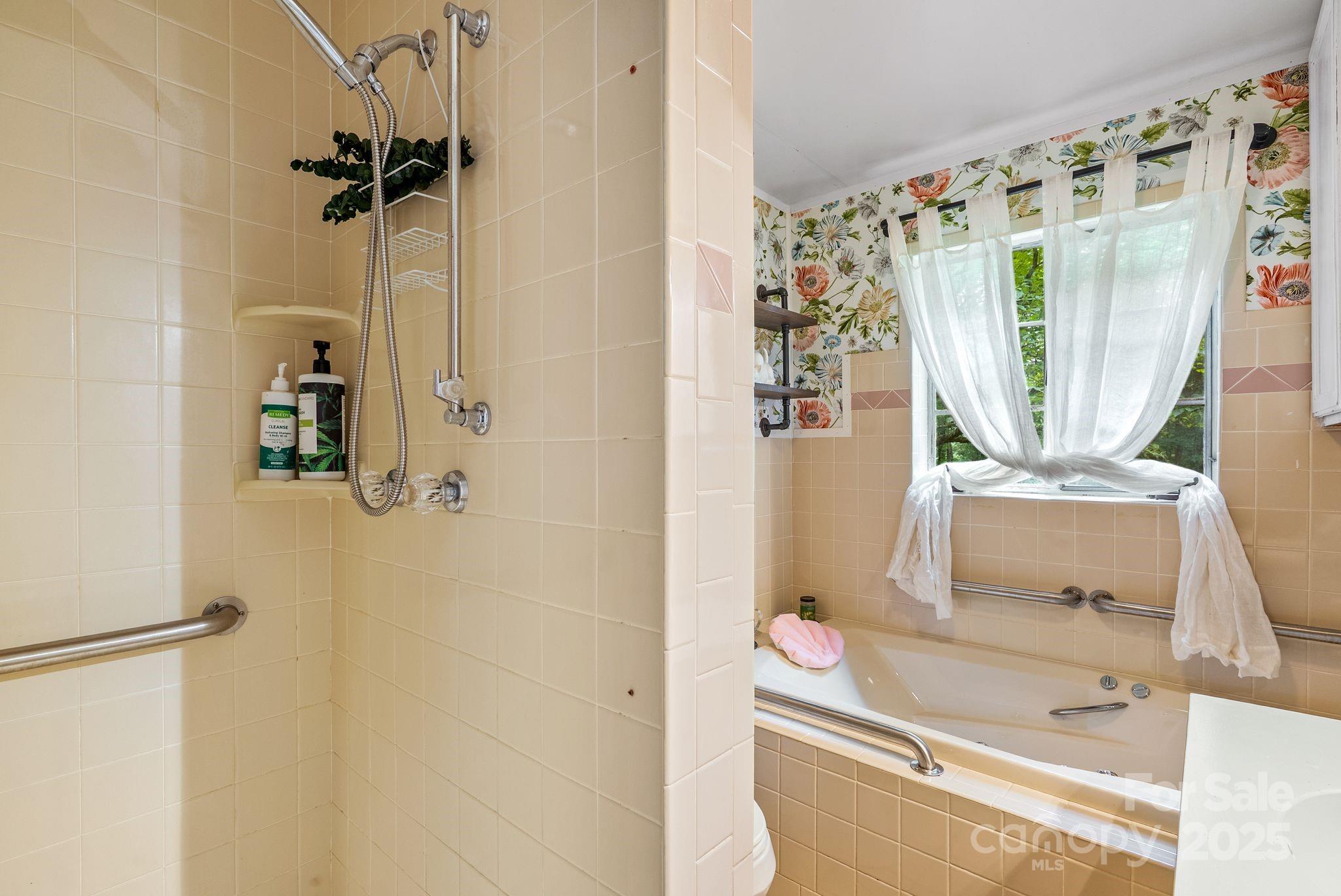 41 Hilton Drive Brevard, NC 28712 - Photo 23 of 32 a bathroom with a sink and a mirror