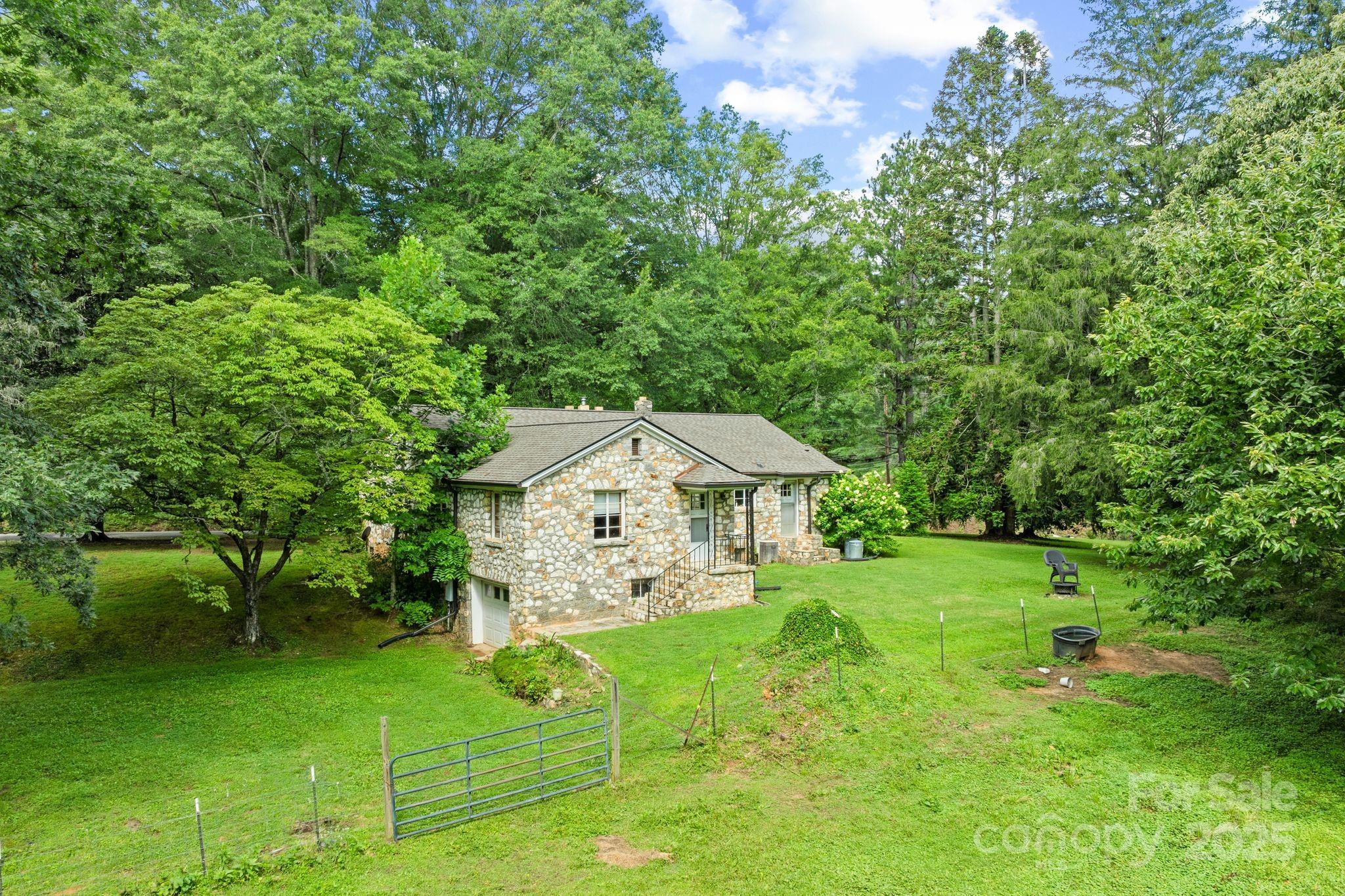 41 Hilton Drive Brevard, NC 28712 - Photo 5 of 32 a view of a house with a yard