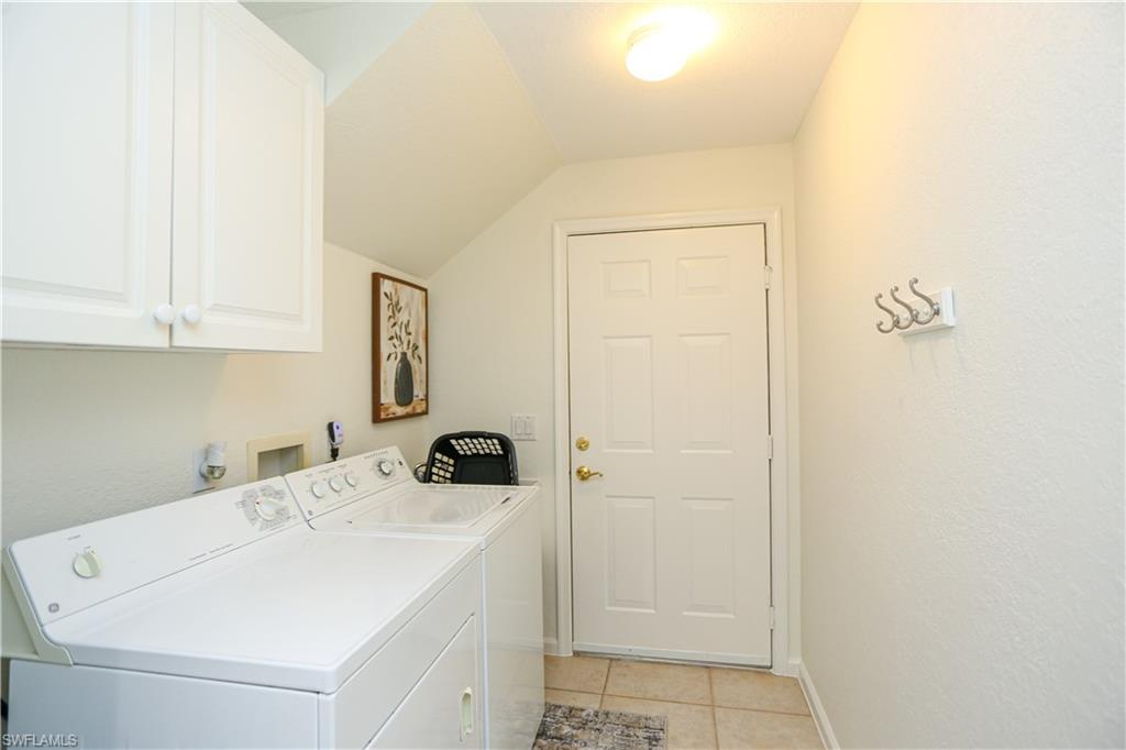 3930 Deer Crossing Court, Unit 3103 Naples, FL 34114 - Photo 29 of 50 a bathroom with a sink and a mirror