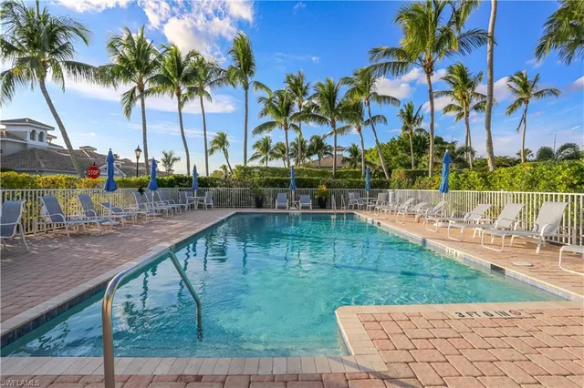 a view of swimming pool with a patio