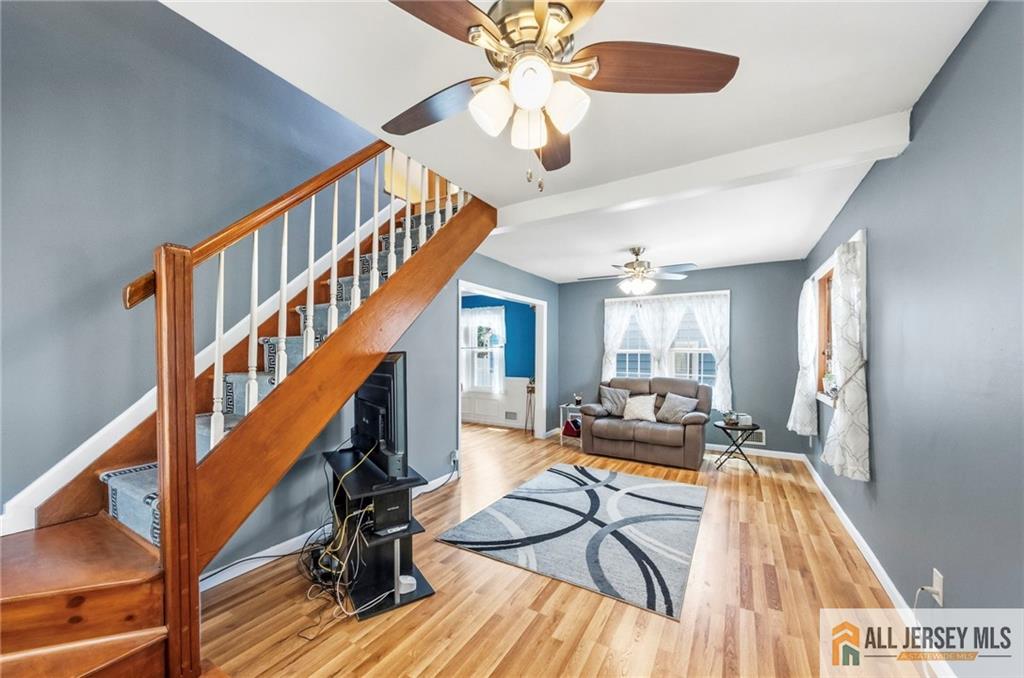 50 3rd Street Fords, NJ 08863 - Photo 5 of 36 a living room with furniture and a wooden floor