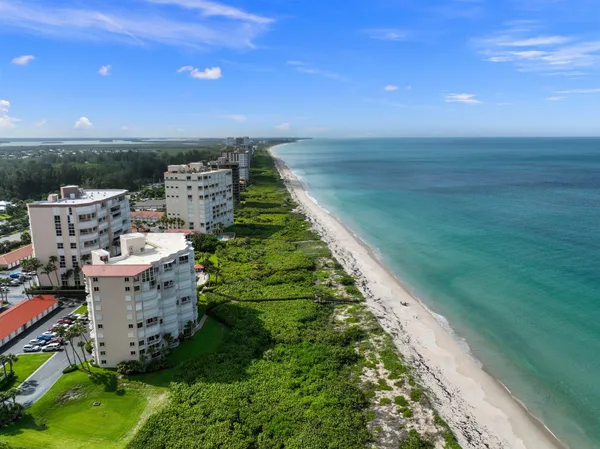 a view of a city with an ocean view
