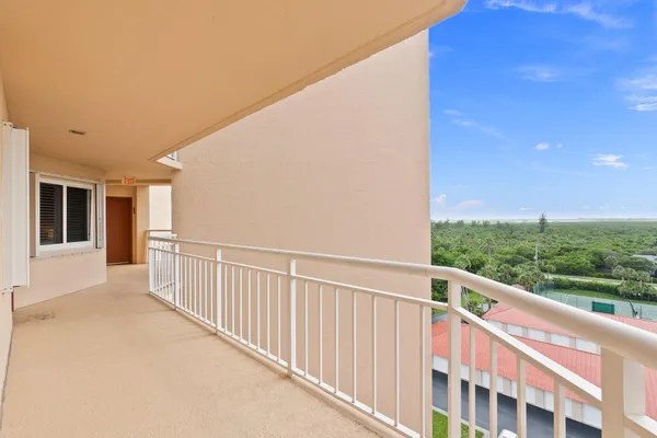 a view of a balcony with an outdoor space