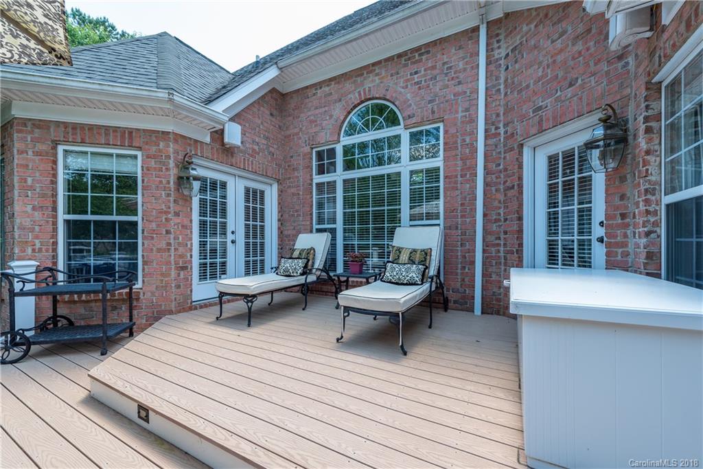 904 Ashford Way, Unit 2 Fort Mill, SC 29708 - Photo 20 of 24 a roof deck with a couch and wooden floor