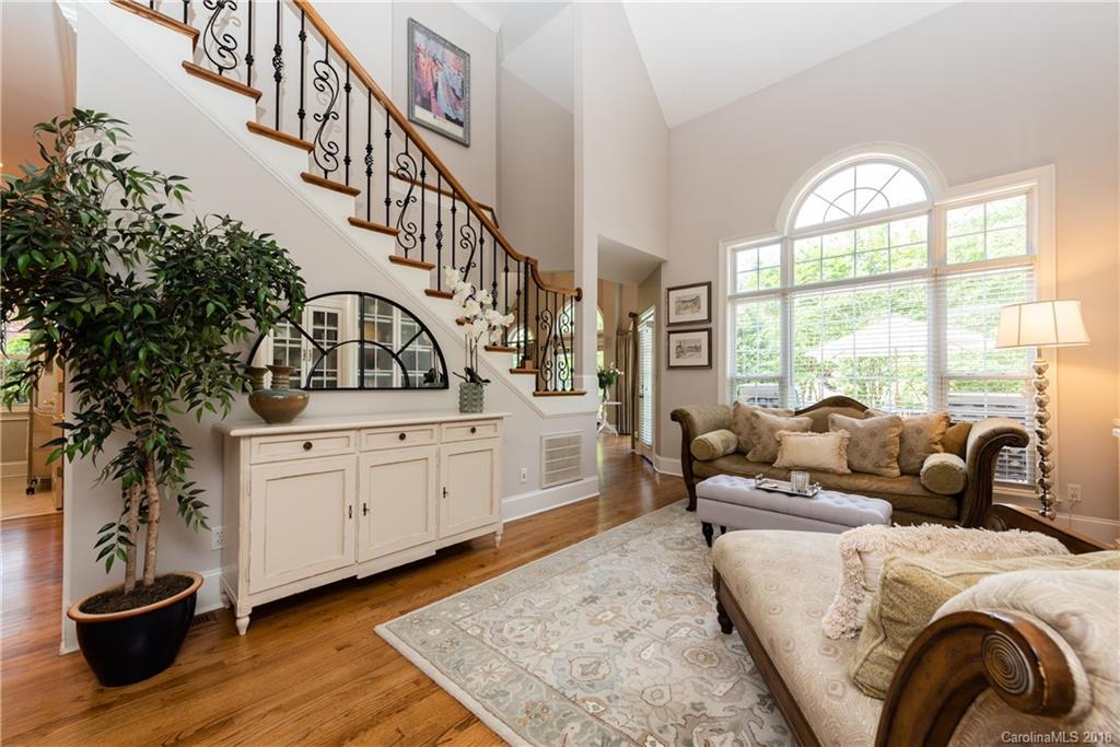 904 Ashford Way, Unit 2 Fort Mill, SC 29708 - Photo 5 of 24 a living room with furniture a fireplace and a potted plant