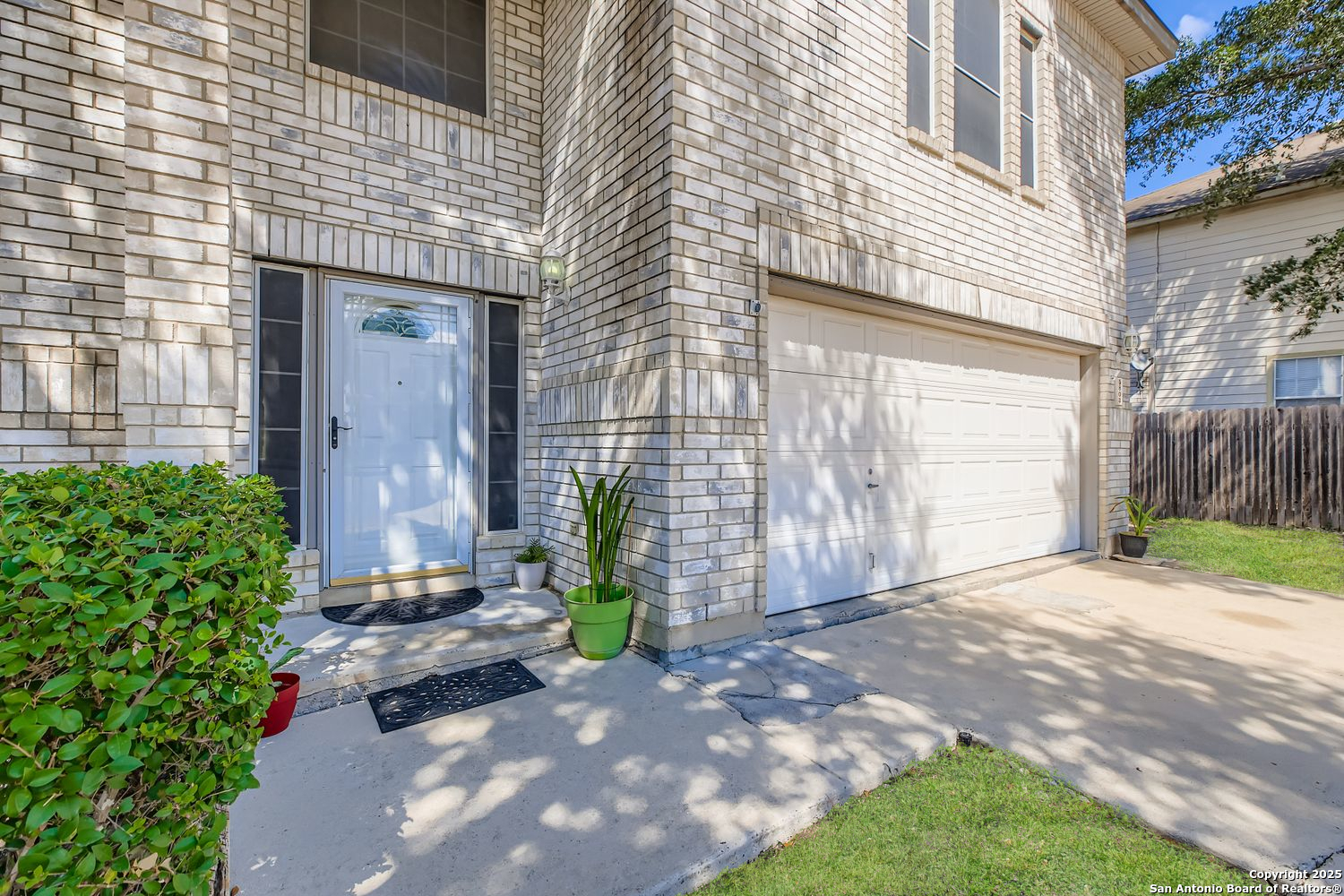 5803 Spring Pebble San Antonio, TX 78247 - Photo 3 of 27 a view of a backyard with potted plants