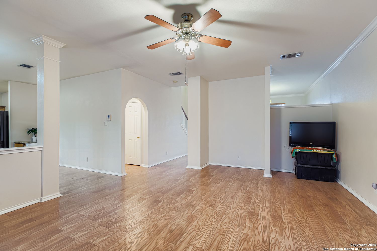 5803 Spring Pebble San Antonio, TX 78247 - Photo 6 of 27 a view of a livingroom with a chandelier fan and entryway