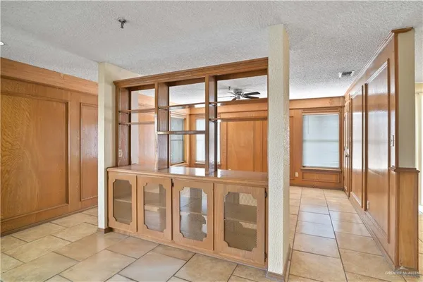 a view of a large room with windows