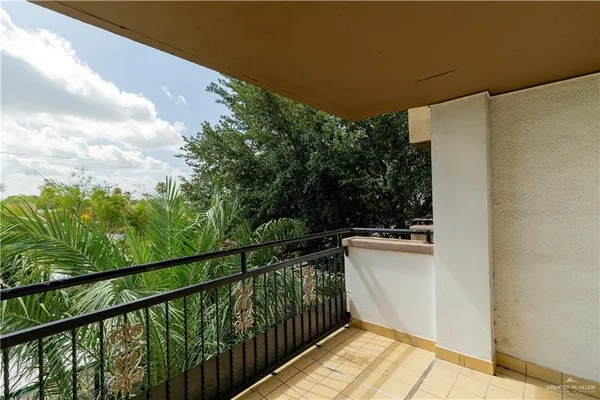a balcony with an outdoor space