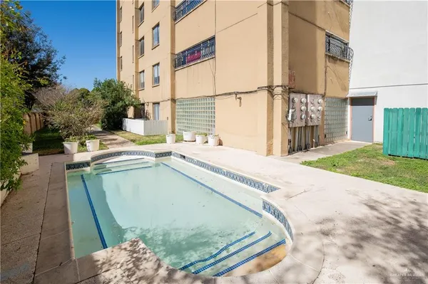 a view of balcony with patio
