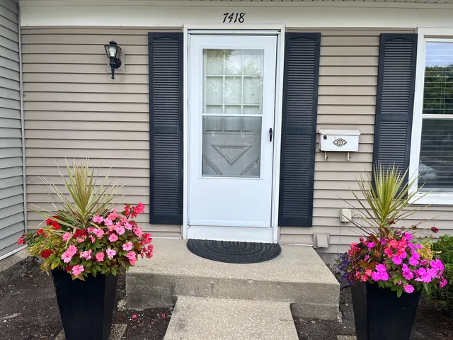 a flowers in front of a house