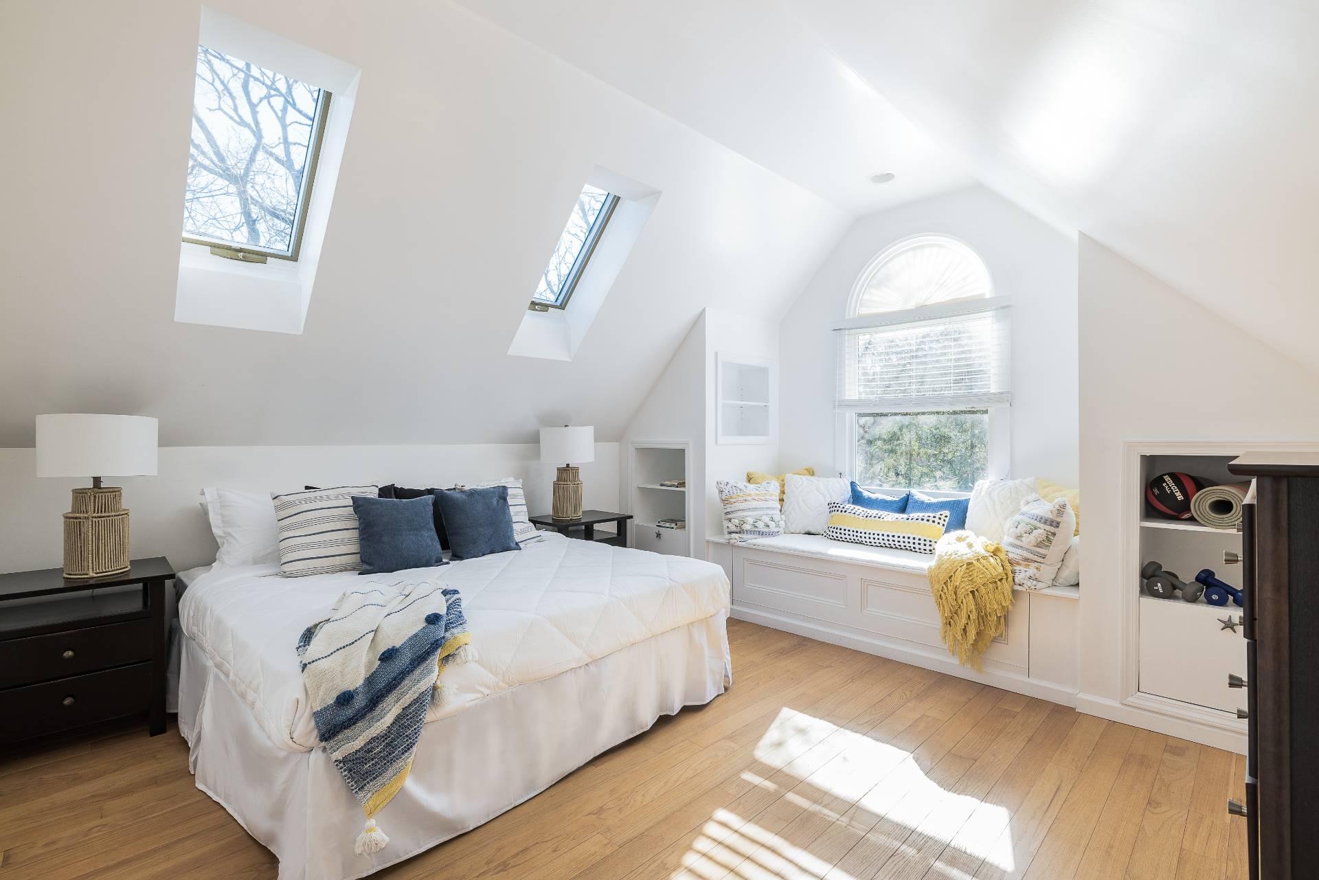 27 Ocean Parkway East Hampton, NY 11937 - Photo 12 of 21 a bedroom with a bed and a large window