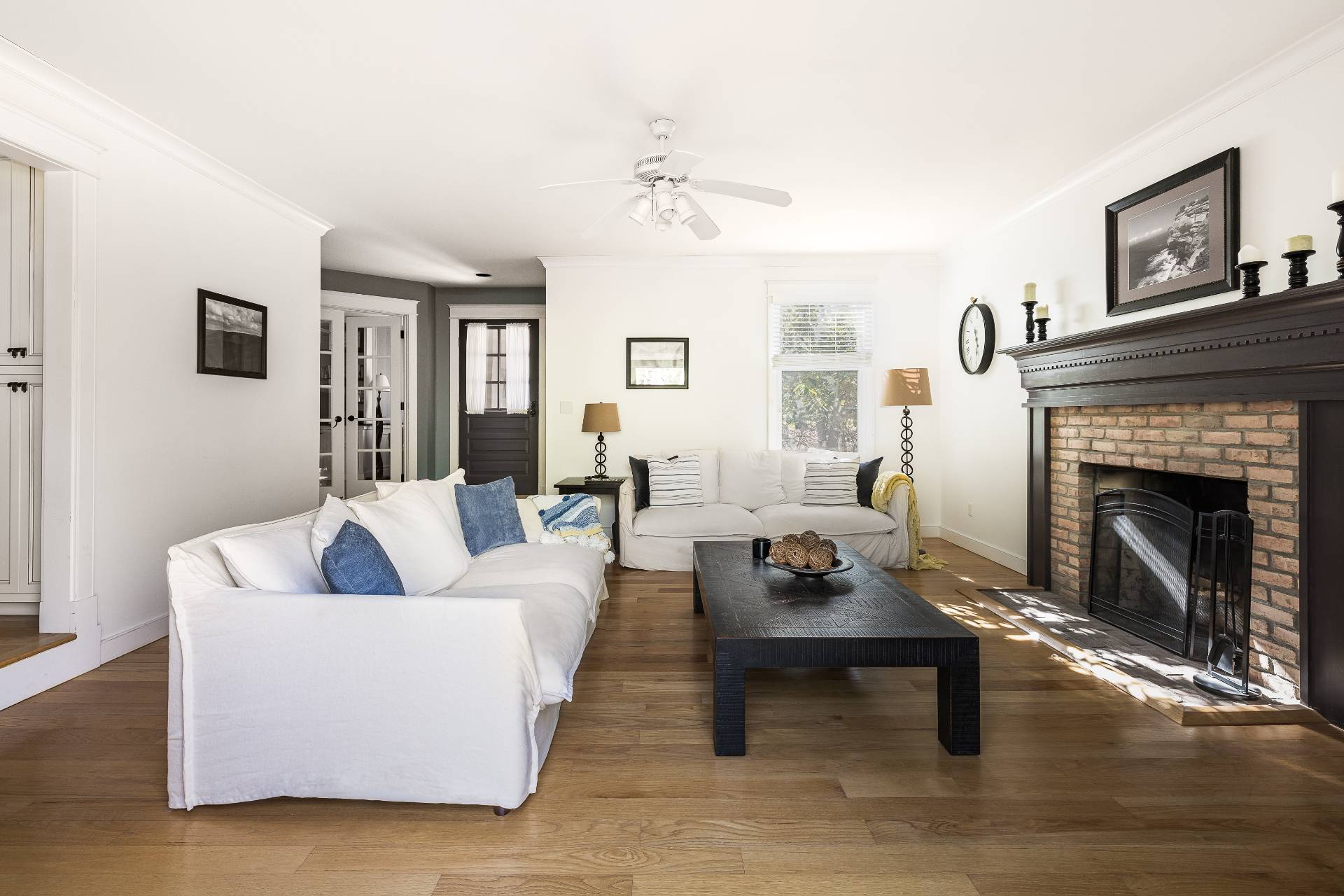 27 Ocean Parkway East Hampton, NY 11937 - Photo 4 of 21 a living room with furniture and a fireplace