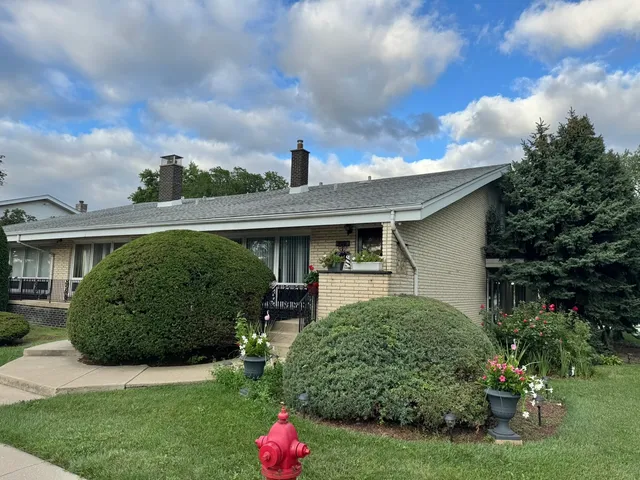 a view of a house with a garden