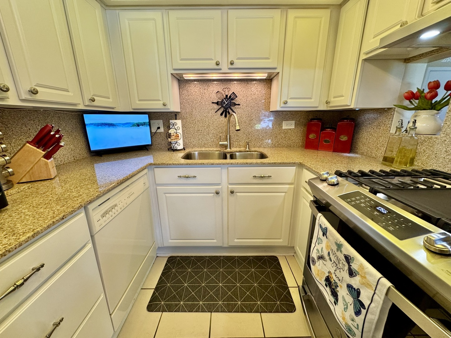 1247 South Mannheim Road, Unit 3 Westchester, IL 60154 - Photo 12 of 41 a kitchen with a stove and cabinets