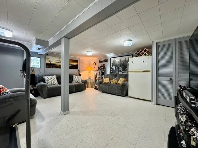 a large white room with furniture