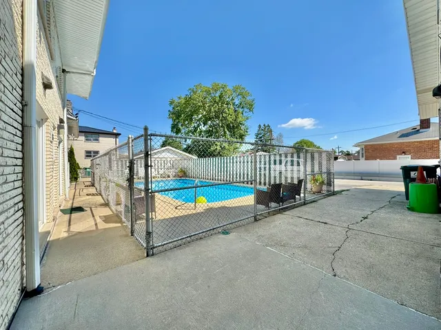 a view of a room with wooden fence