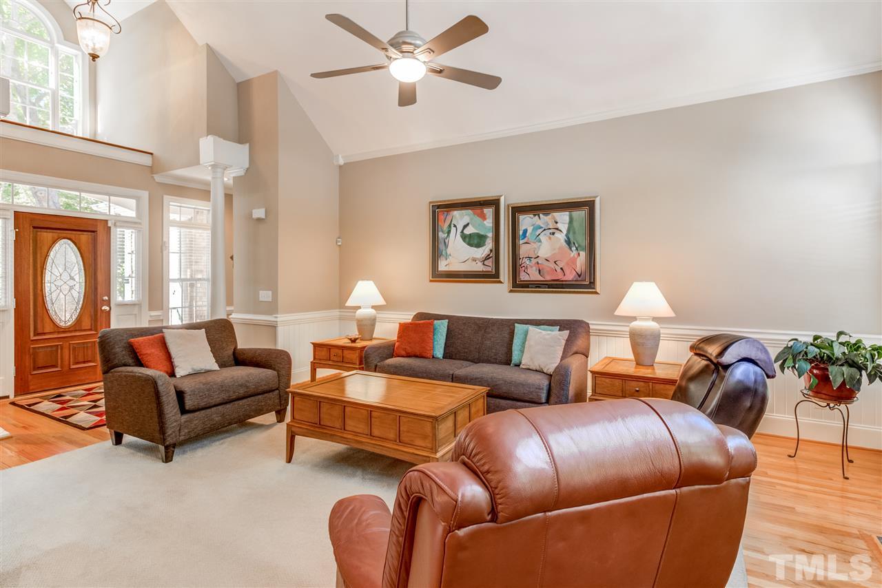 11604 John Allen Road Raleigh, NC 27614 - Photo 11 of 25 a living room with furniture a lamp and a chandelier