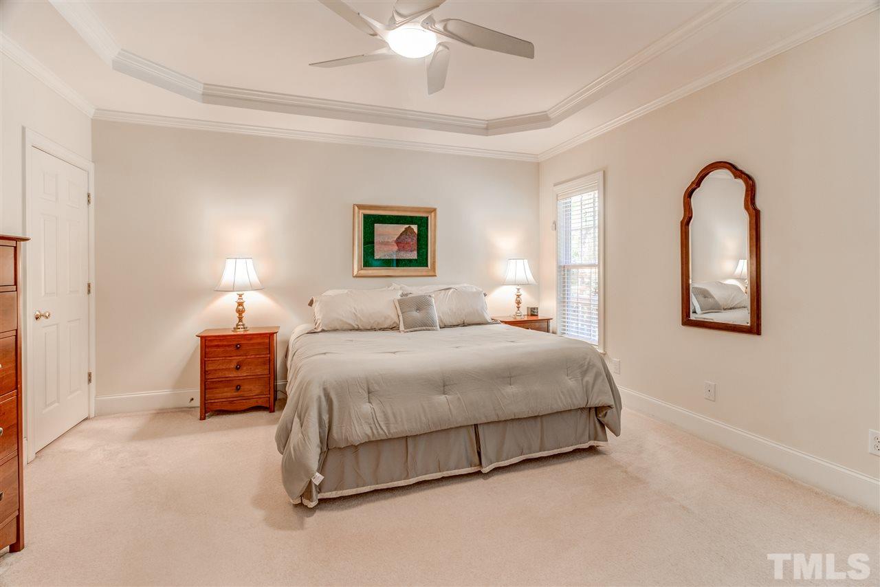 11604 John Allen Road Raleigh, NC 27614 - Photo 14 of 25 a bedroom with a bed and a painting