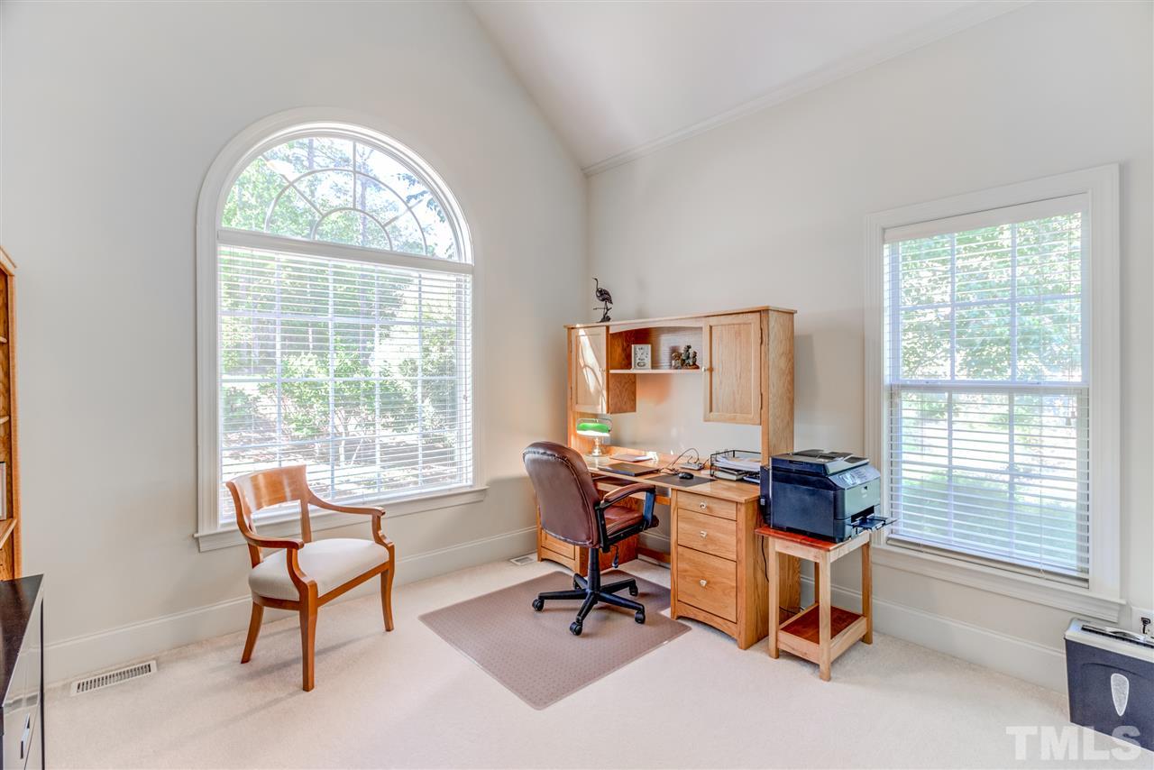 11604 John Allen Road Raleigh, NC 27614 - Photo 16 of 25 a view of a livingroom with workspace and a window