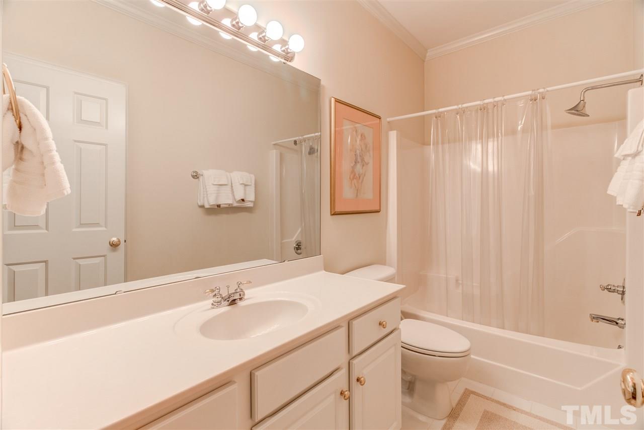11604 John Allen Road Raleigh, NC 27614 - Photo 17 of 25 a bathroom with a sink a toilet and shower