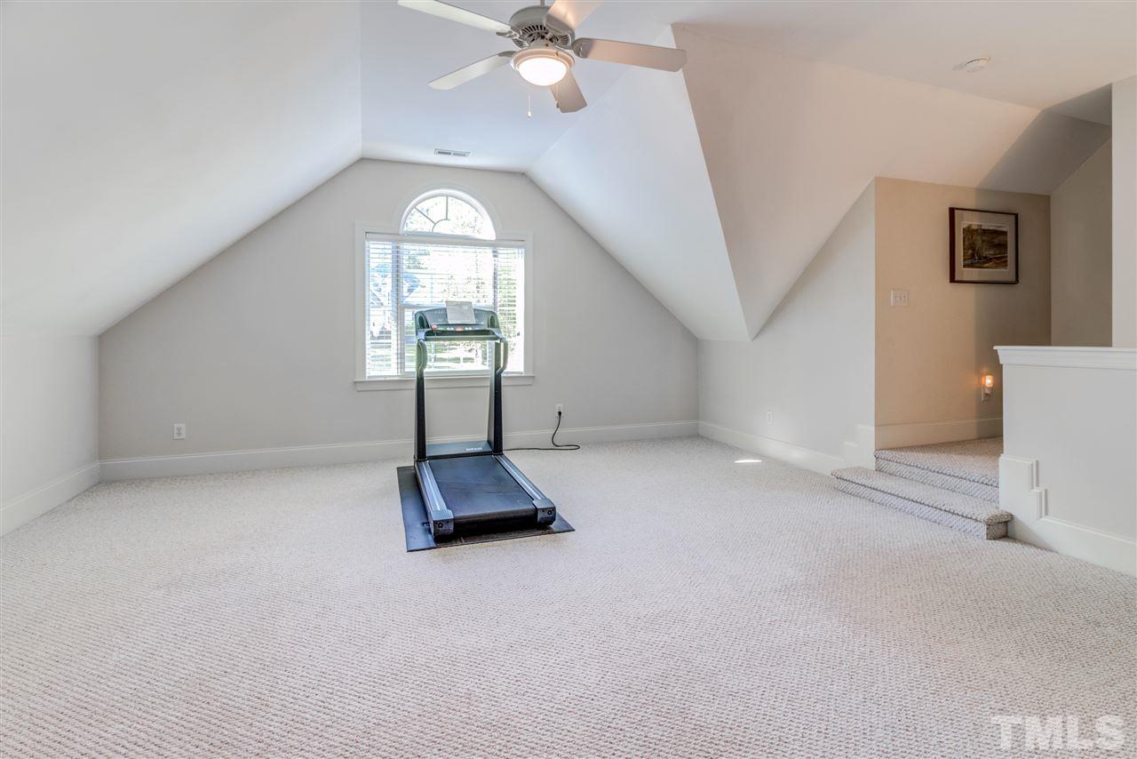 11604 John Allen Road Raleigh, NC 27614 - Photo 19 of 25 an empty room with windows and ceiling fan