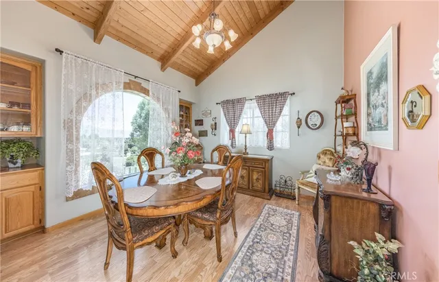 a spacious bedroom with a bed and a dresser