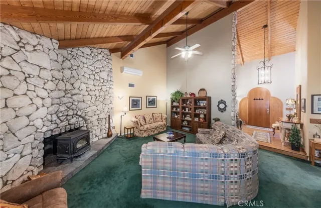 a room with a fireplace and painted walls