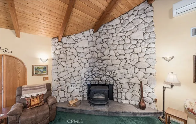 a living room with furniture fireplace and furniture