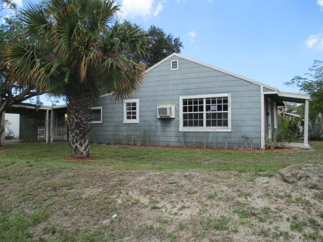 102 East 22nd Court Riviera Beach, FL 33404 - Photo 2 of 9 SIDE
