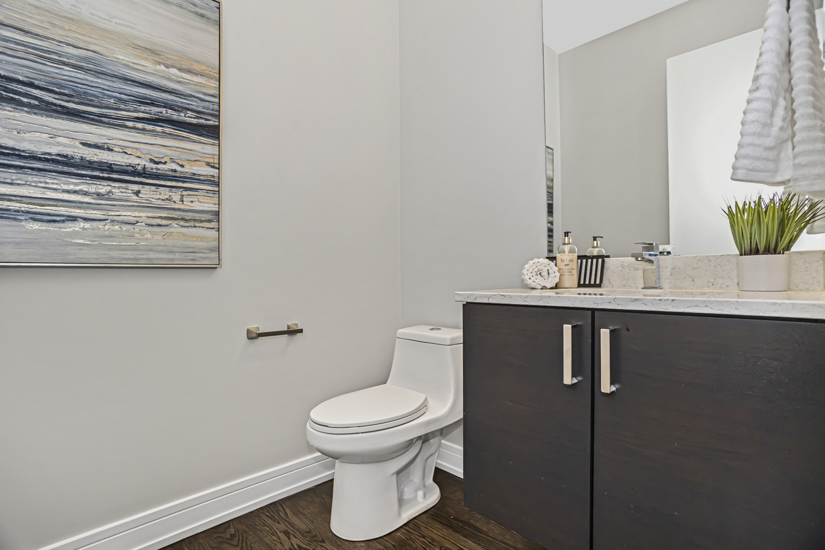 715 South May Street, Unit 1N Chicago, IL 60607 - Photo 12 of 25 a bathroom with a sink and a toilet