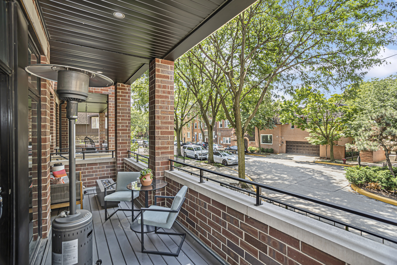715 South May Street, Unit 1N Chicago, IL 60607 - Photo 13 of 25 a view of a chair and tables in the balcony