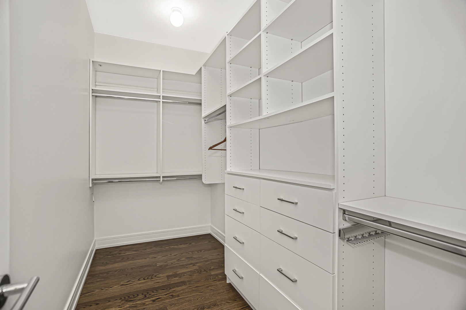 715 South May Street, Unit 1N Chicago, IL 60607 - Photo 16 of 25 a view of walk in closet with empty racks