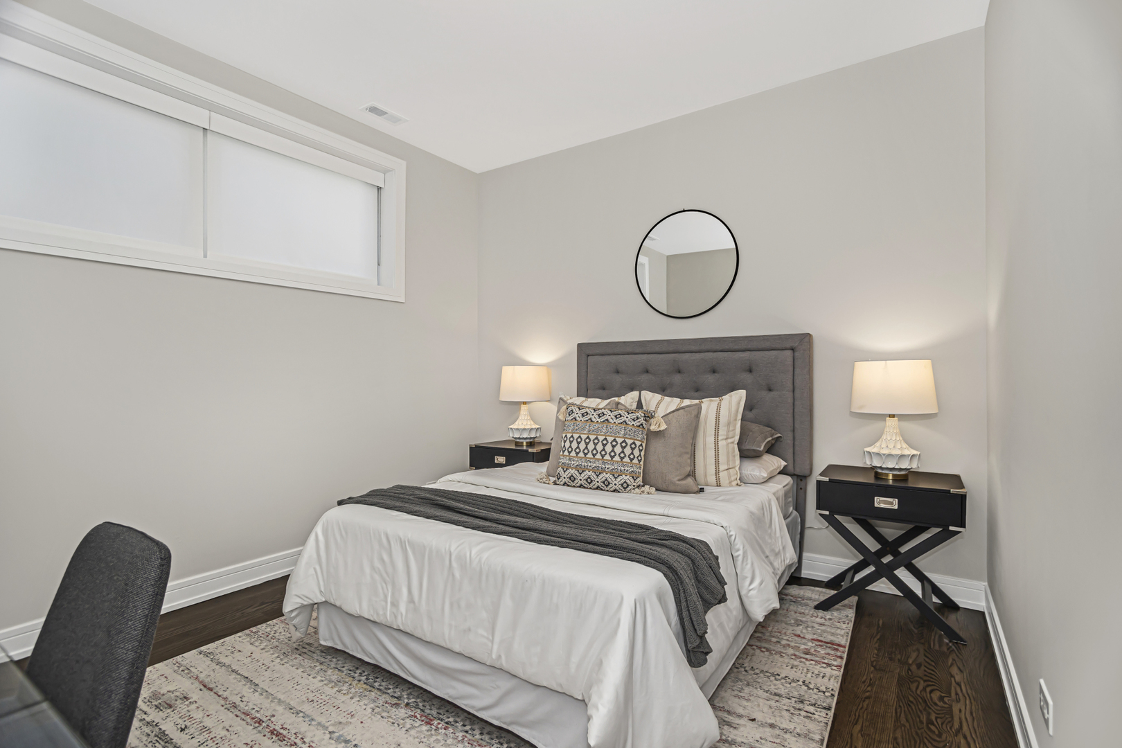 715 South May Street, Unit 1N Chicago, IL 60607 - Photo 18 of 25 a bedroom with a bed and wooden floor