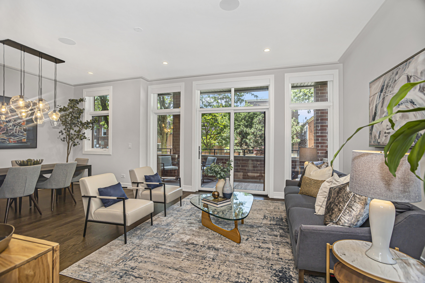715 South May Street, Unit 1N Chicago, IL 60607 - Photo 3 of 25 a living room with furniture and a large window