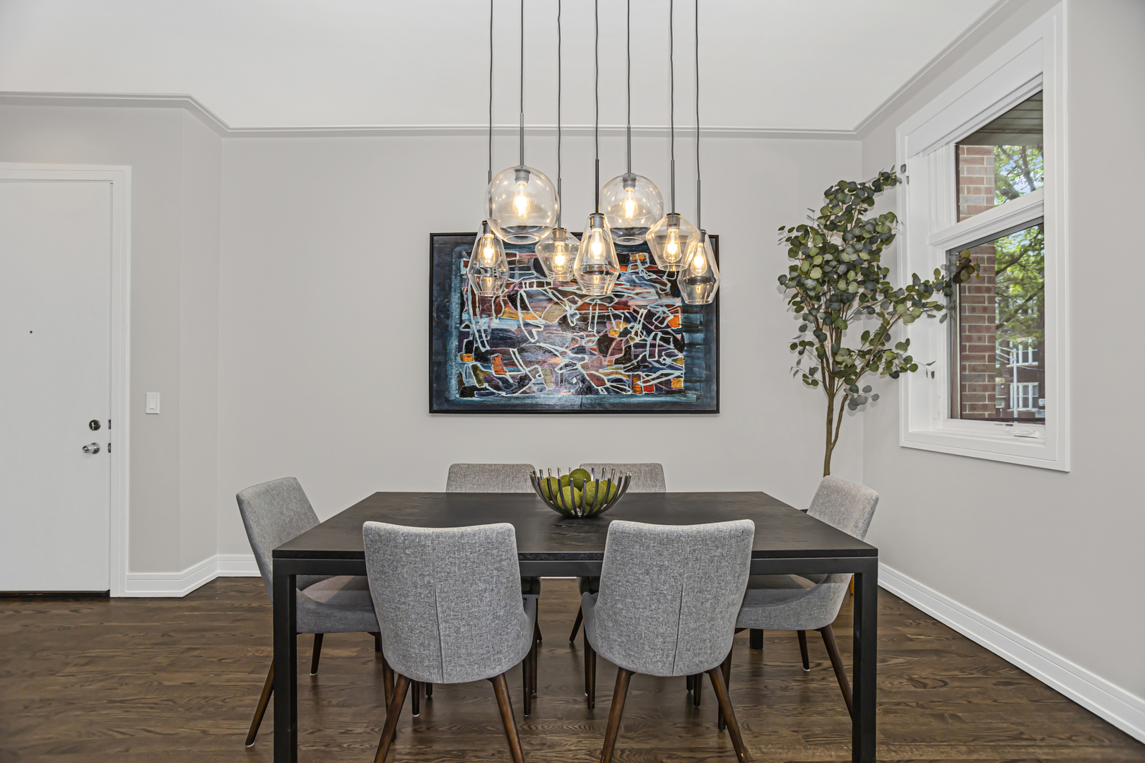 715 South May Street, Unit 1N Chicago, IL 60607 - Photo 6 of 25 a view of a dining room with furniture window and wooden floor