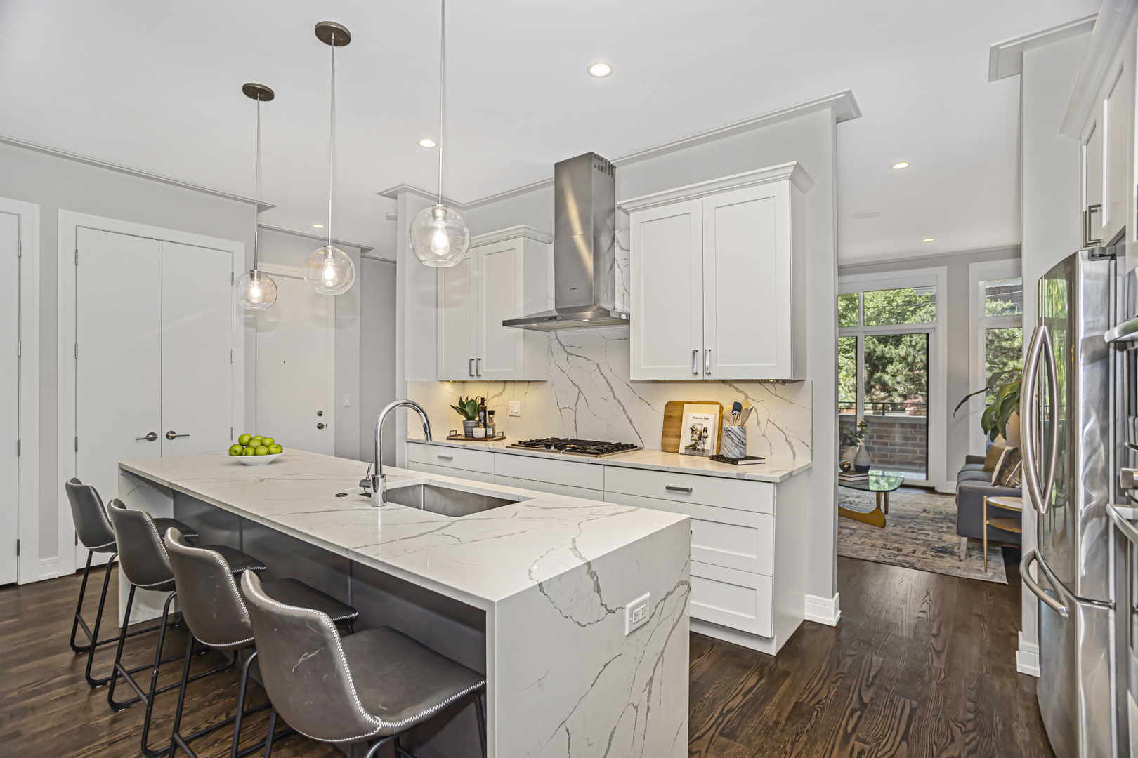 715 South May Street, Unit 1N Chicago, IL 60607 - Photo 9 of 25 a kitchen with a sink a stove and a refrigerator